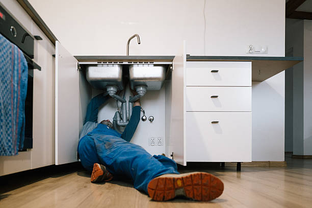 Professional Drain Cleaning technician working in Canton, NC